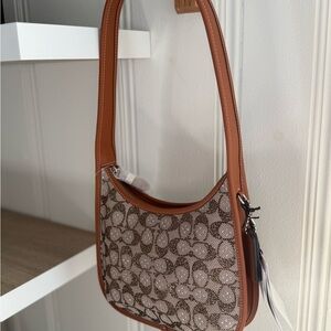 Coach crystal curve zip bag NWT